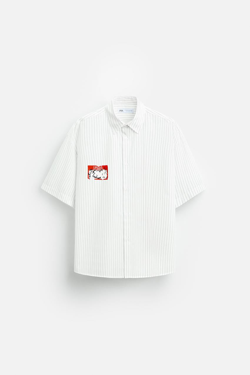 STRIPED SHIRT WITH PRINTED STICKER