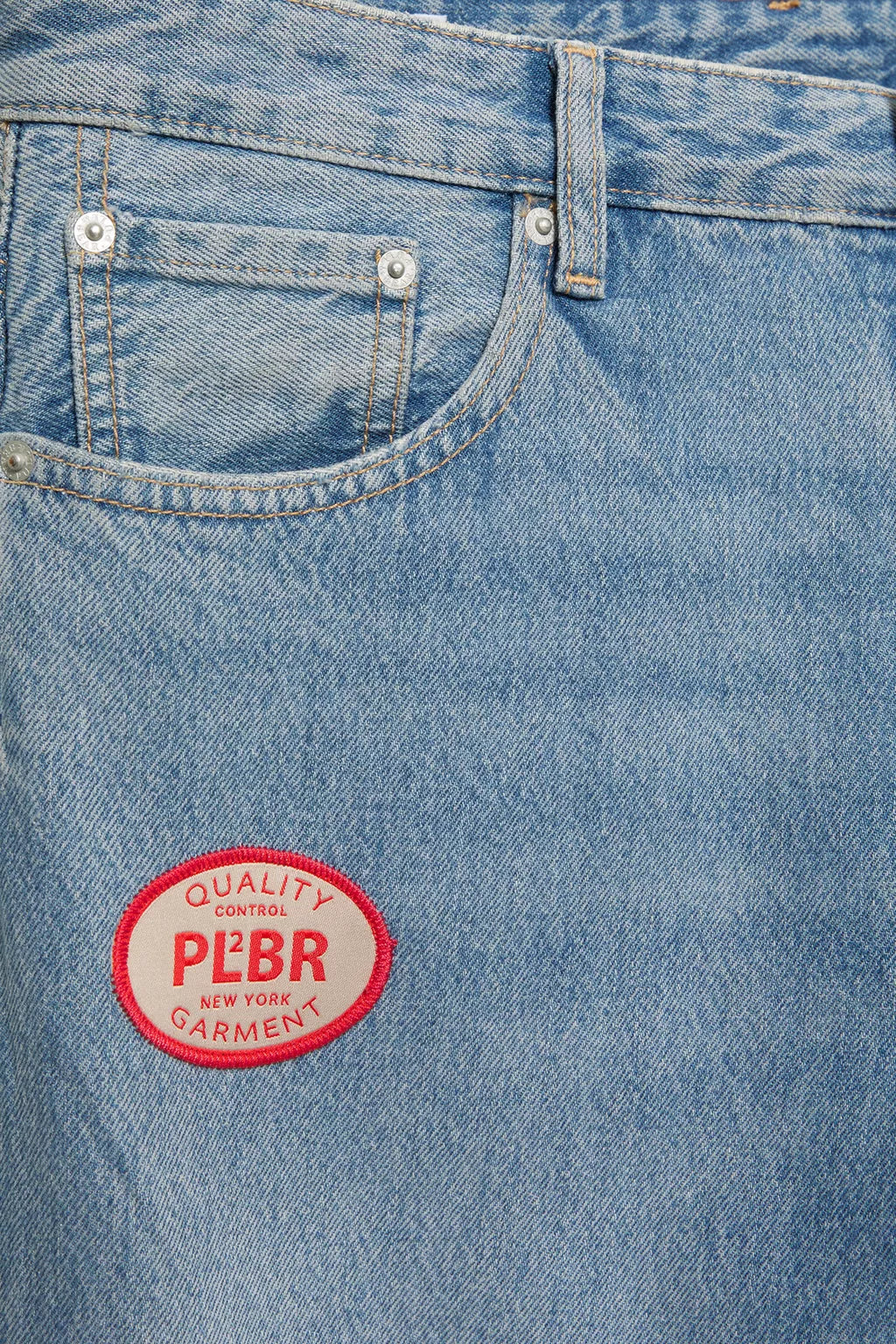 STRAIGHT LEG JEANS WITH PATCHES