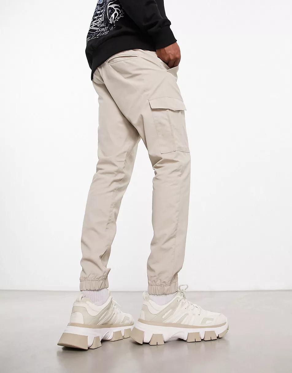 TECH CARGO TROUSERS IN LIGHT STONE