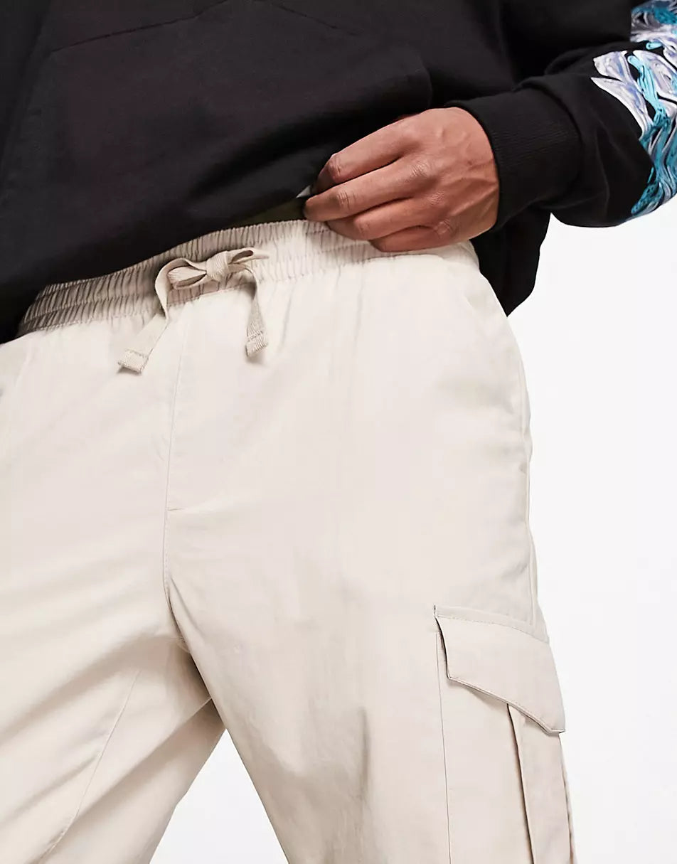 TECH CARGO TROUSERS IN LIGHT STONE