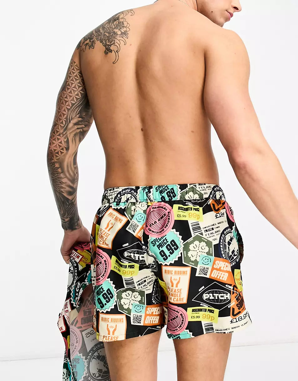 CO-ORD SWIM SHORTS IN SHORT LENGTH IN STICKER PRINT