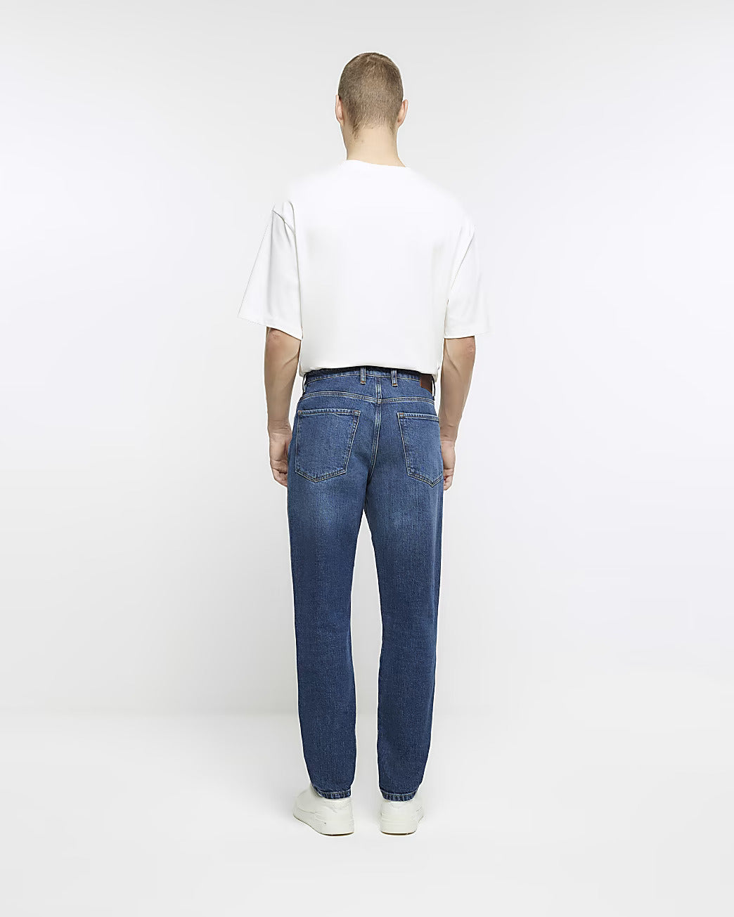 BLUE TAPERED FIT FADED JEANS