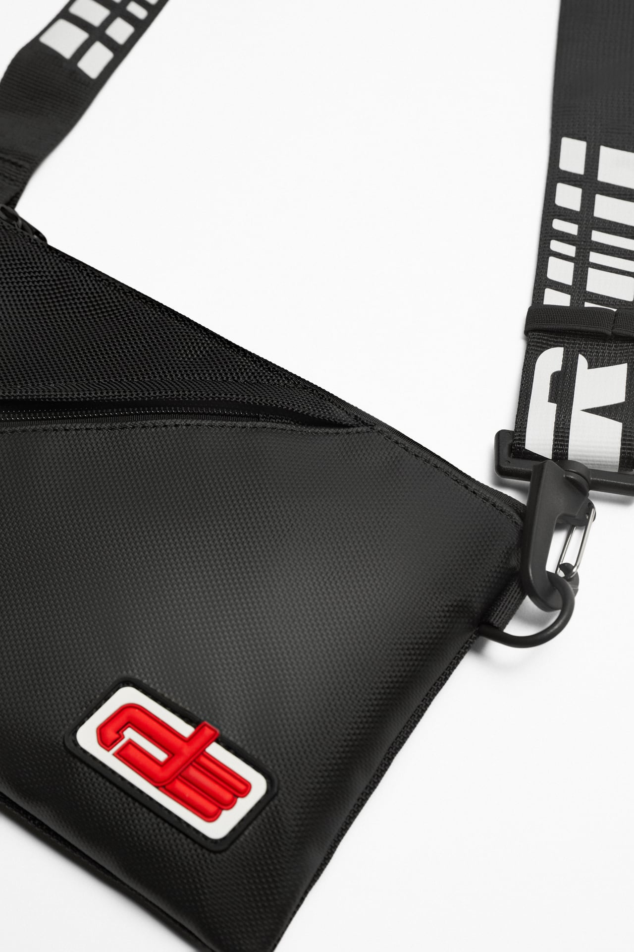 SPORTY CROSSBODY BACKPACK