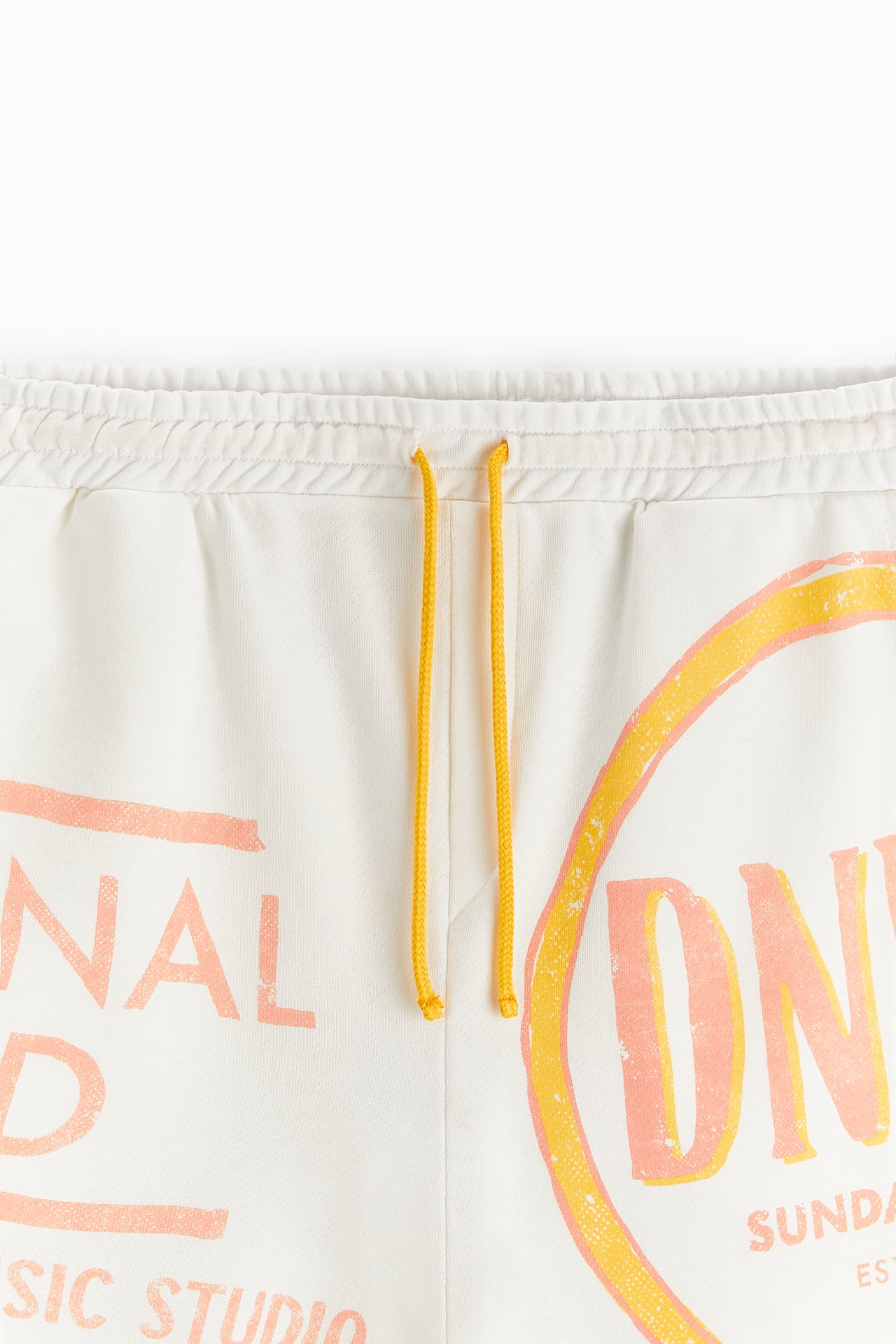 BERMUDA SHORTS WITH PRINTED GRAPHICS