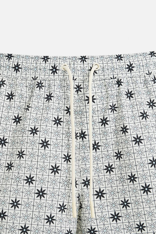 GEOMETRIC PRINT MID-LENGTH SWIMMING TRUNKS