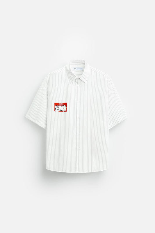 STRIPED SHIRT WITH PRINTED STICKER