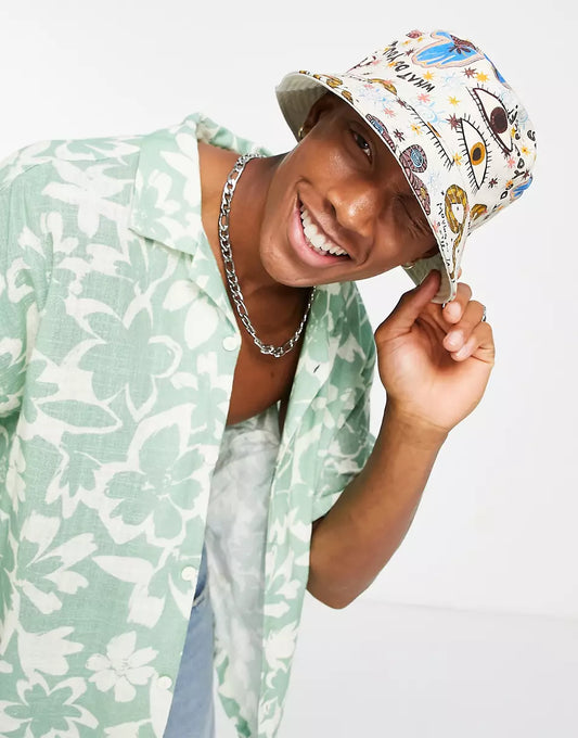 REVERSIBLE BUCKET HAT IN ABSTRACT PRINT