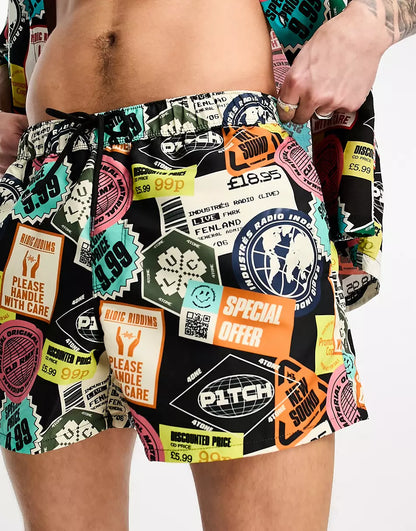CO-ORD SWIM SHORTS IN SHORT LENGTH IN STICKER PRINT