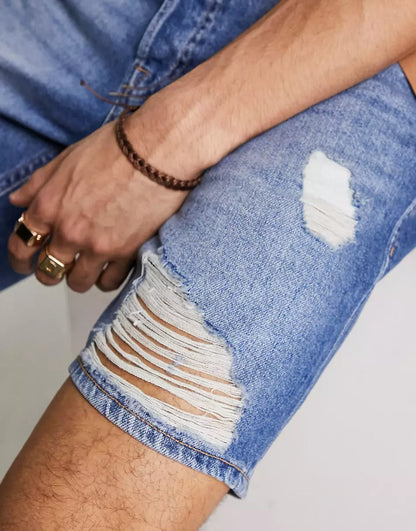 INTELLIGENCE RELAXED FIT DENIM SHORTS WITH DISTRESSING IN LIGHT WASH