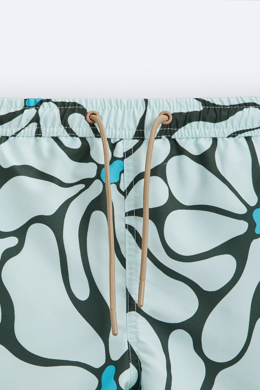 FLORAL PRINT SWIMMING TRUNKS