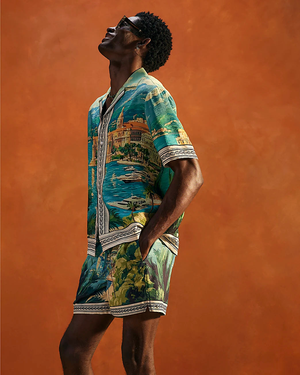BLUE MOONSTONE SCENIC BORDER SWIM SHORTS