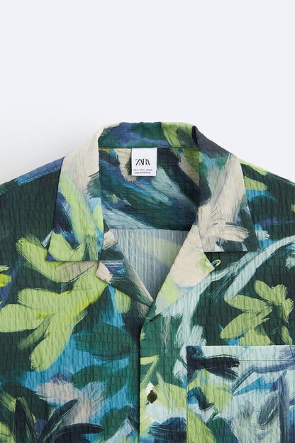 Abstract print shirt, Textured shirt, Button-down shirt, Short-sleeved shirt, Camp collar shirt, Chest patch pocket, Button-up front, Polyester shirt, Machine washable shirt, Relaxed fit shirt,