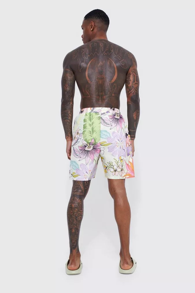 MID LENGTH FLORAL SWIM SHORTS